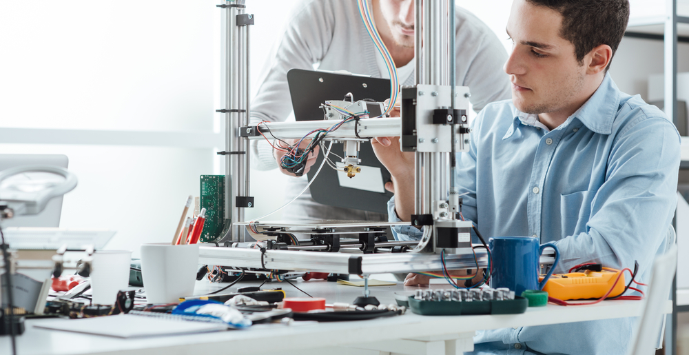 Engineer working on an invention Engineer working on an invention